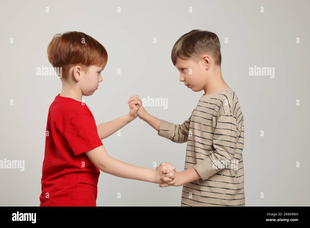 Cartoon illustration two boys fighting hi-res stock photography and images  - Alamy