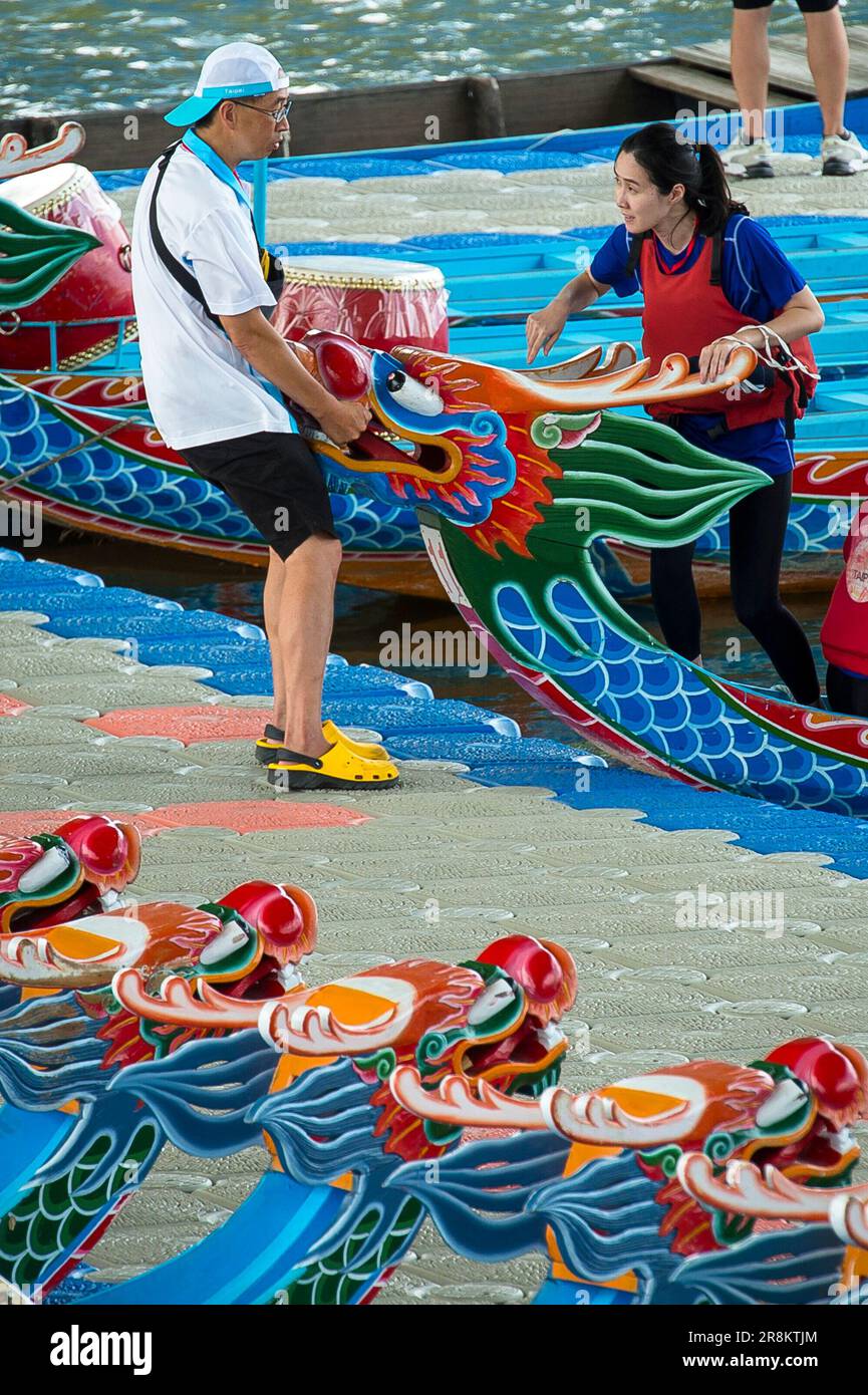 Taipei. 22nd June, 2023. Crew members prepare to start in a traditional
