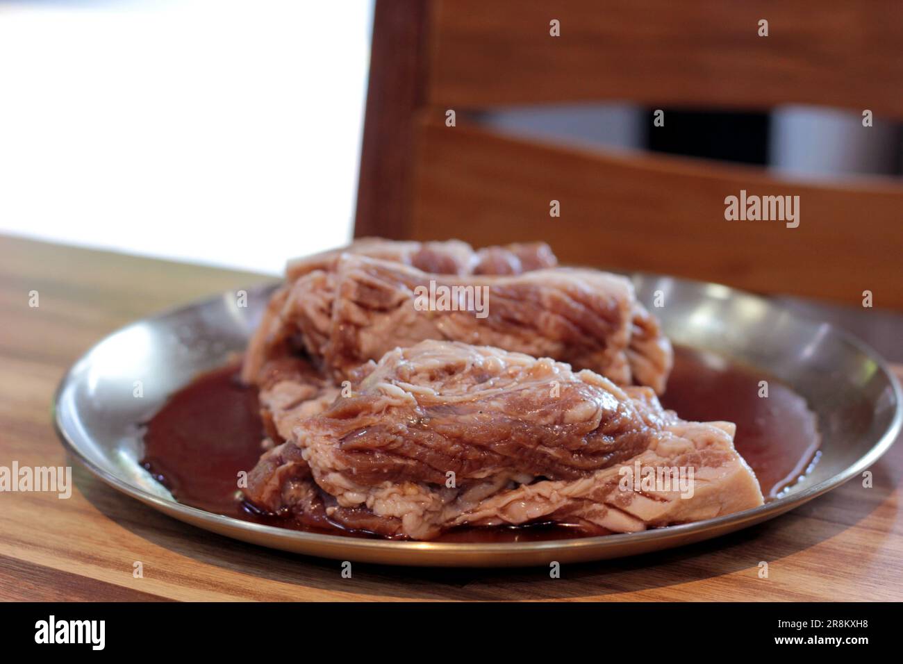 Korean pork ribs and beef marbled Korean BBQ style charcoal grill Stock Photo