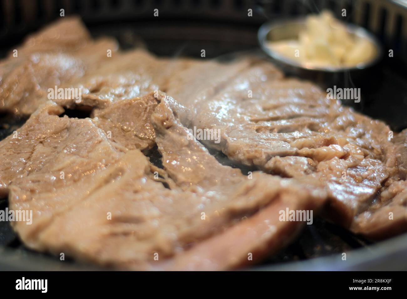 Korean pork ribs and beef marbled Korean BBQ style charcoal grill Stock Photo