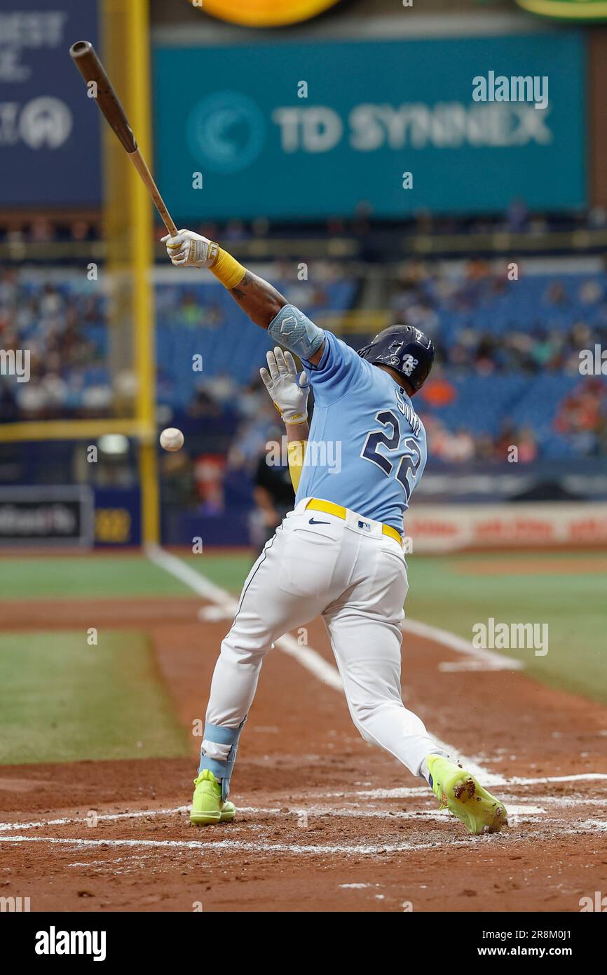 St. Petersburg, FL USA; Tampa Bay Rays center fielder Jose Siri (22) drives a ball down the first base line during an MLB game against the Baltimore O Stock Photo