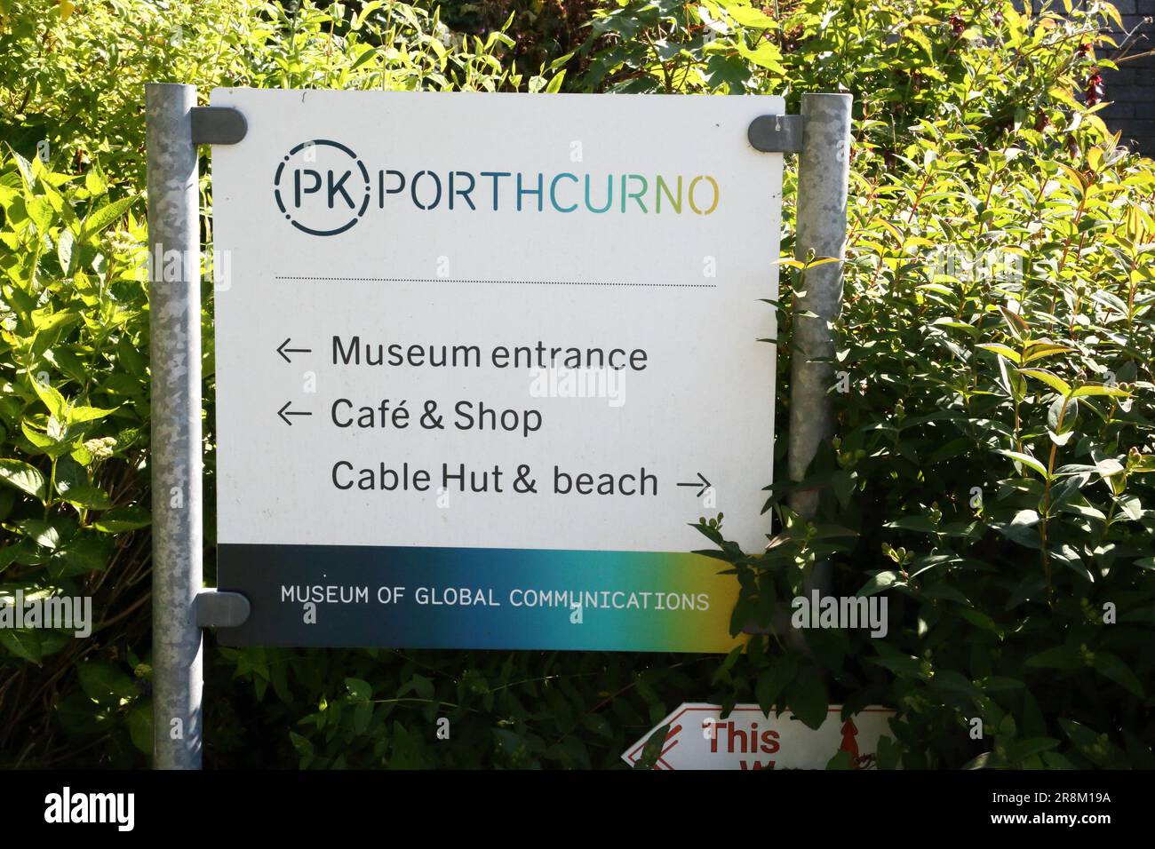 Sign giving directions to the Museum of Global Communications in