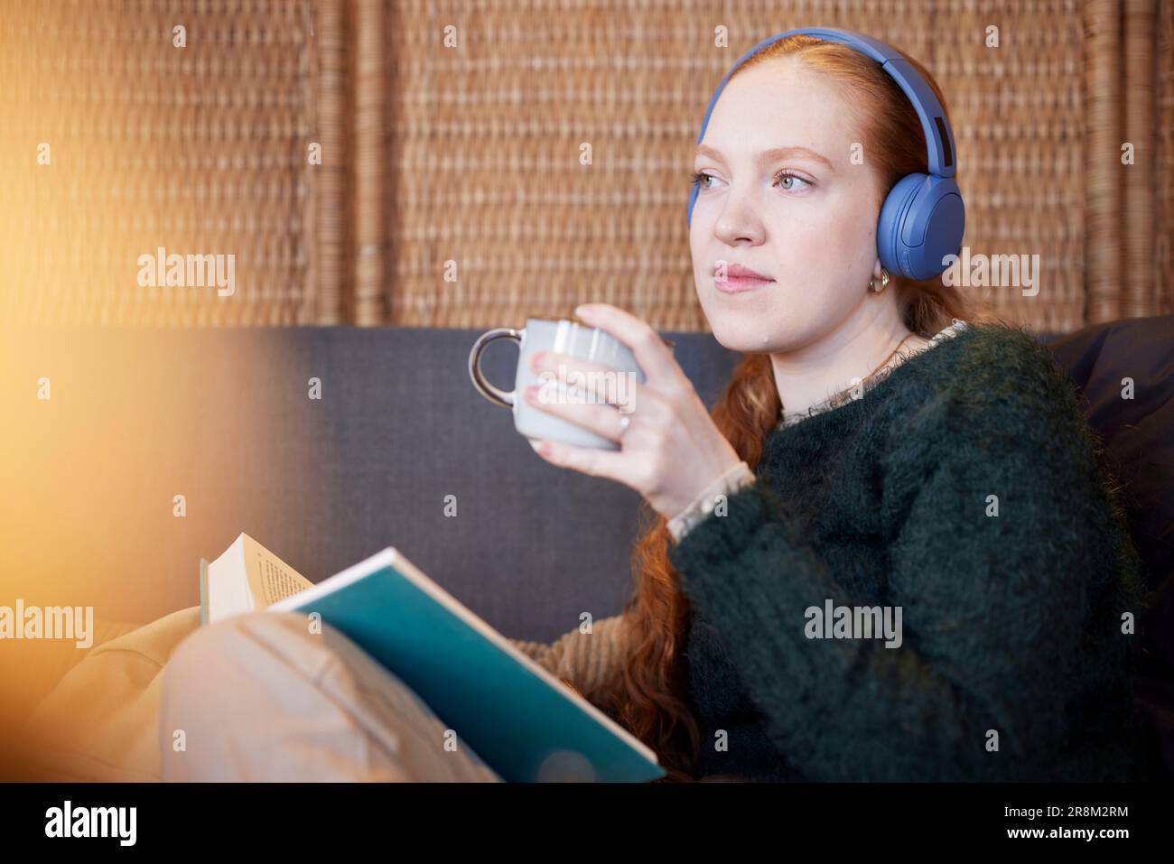 Woman reading book listening hi-res stock photography and images - Alamy