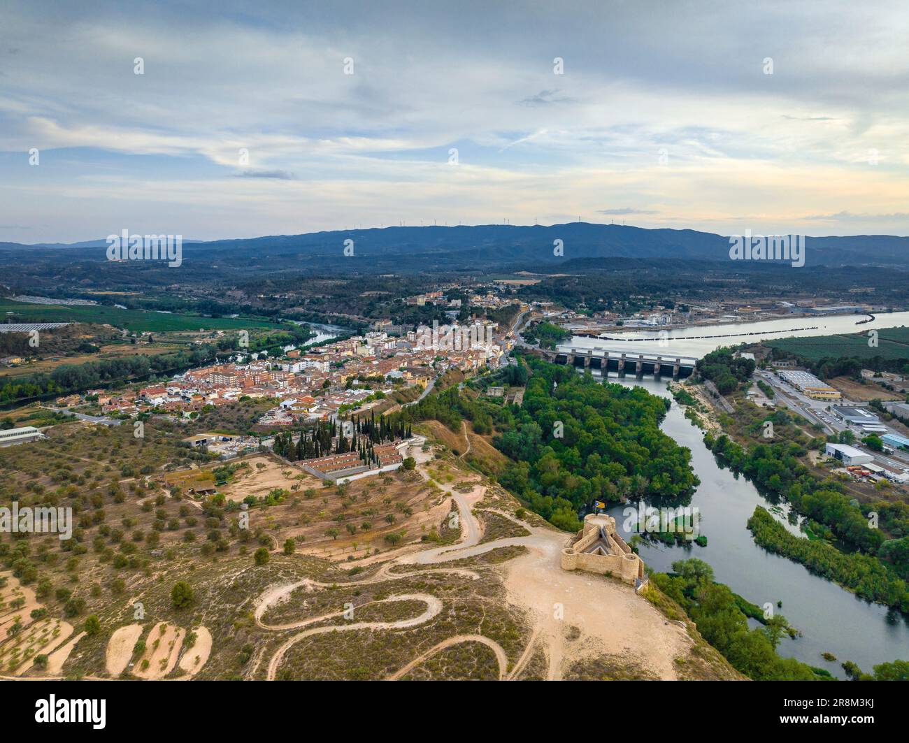 Aerial view of the village of Flix next to the Ebro river (Ribera d'Ebre, Tarragona, Catalonia, Spain) ESP: Vista aérea del pueblo de Flix y río Ebro Stock Photo