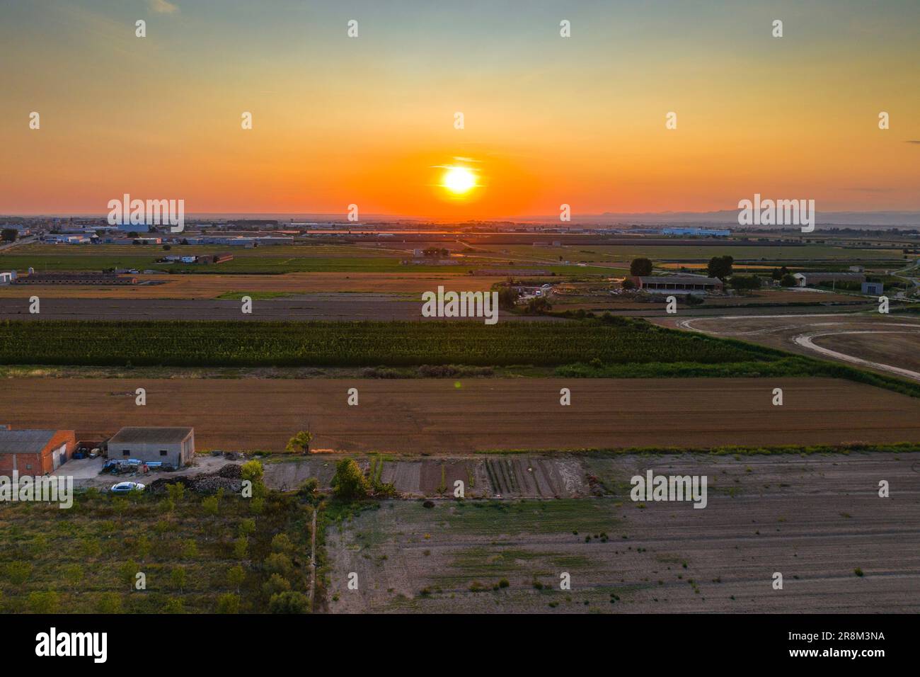 Aerial view of the village of Golmés at sunset (Pla d'Urgell, Lleida, Catalonia, Spain) ESP: Vista aérea del pueblo de Golmés al atardecer (Lérida) Stock Photo