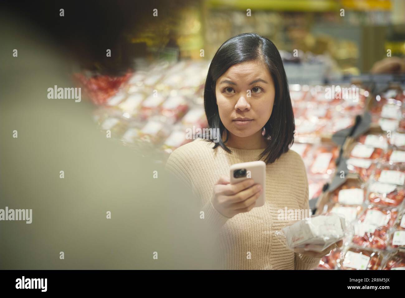 Mature woman standing shop hi-res stock photography and images - Alamy