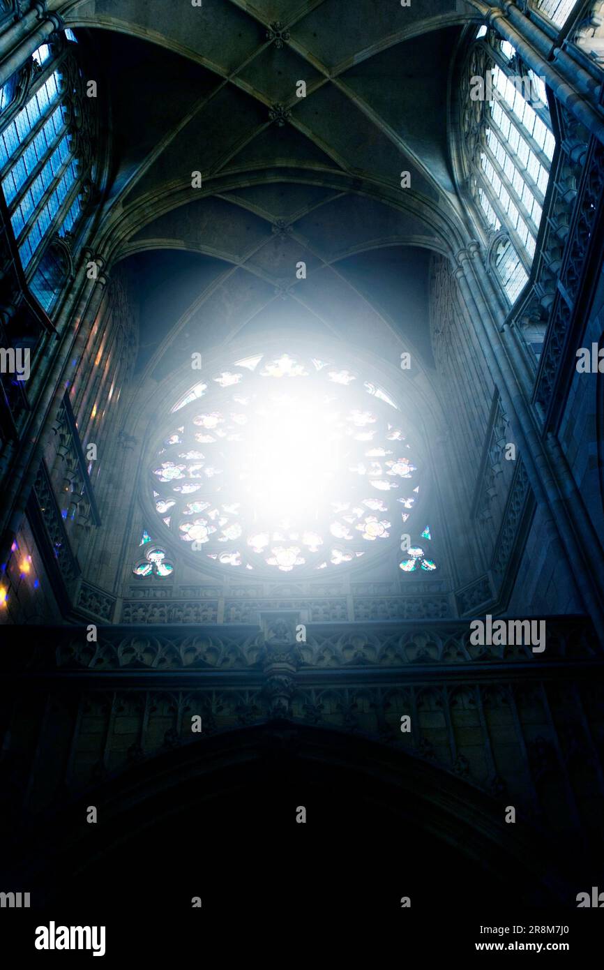 cathedral in Prague, ceiling with light entering from the round window Stock Photo