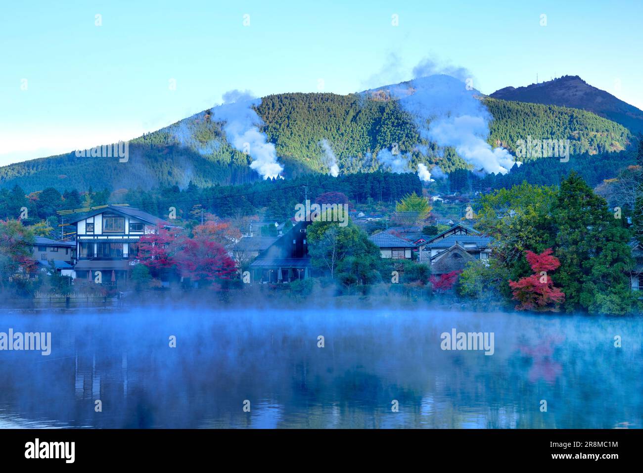 Lake Kinrinko with fall colors and a morning haze Stock Photo
