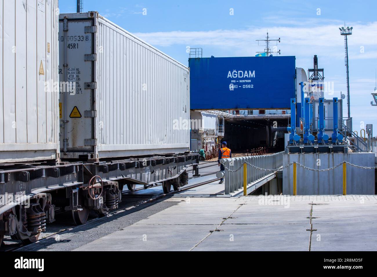 Kuryk, Kazakhstan. 21st June, 2023. Freight cars with containers are loaded onto a ferry at the ferry port of Kuryk and transported across the Caspian Sea. For goods transports between Asia and Europe, the so-called Middle Corridor is becoming increasingly important. The route runs through Central Asia, bypassing Russia in the north and Iran in the south. Credit: Jens Büttner/dpa/Alamy Live News Stock Photo