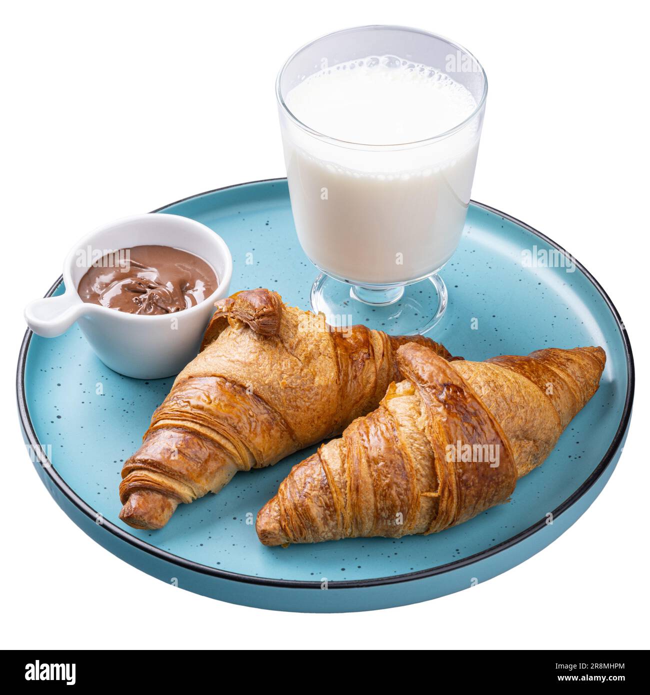 Croissant with chocolate spread and milk, restaurant sweet breakfast menu concept Stock Photo