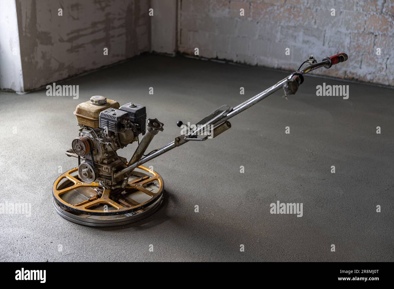 Concrete floor finishing on construction site. Concrete screed with