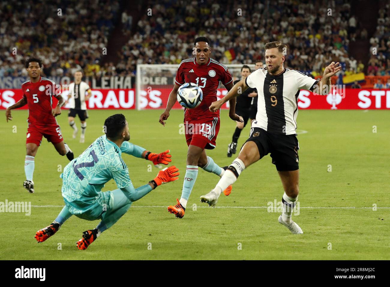 GELSENKIRCHEN - 20/06/2023, (LR) Colombia goalkeeper Alvaro Montero, Yerry Mina of Colombia, Niclas Fullkrug of Germany during the international friendly match between Germany and Colombia at Veltins-Arena on June 20, 2023 in Gelsenkirchen, Germany. AP | Dutch Height | BART STOUTJESDYK Stock Photo