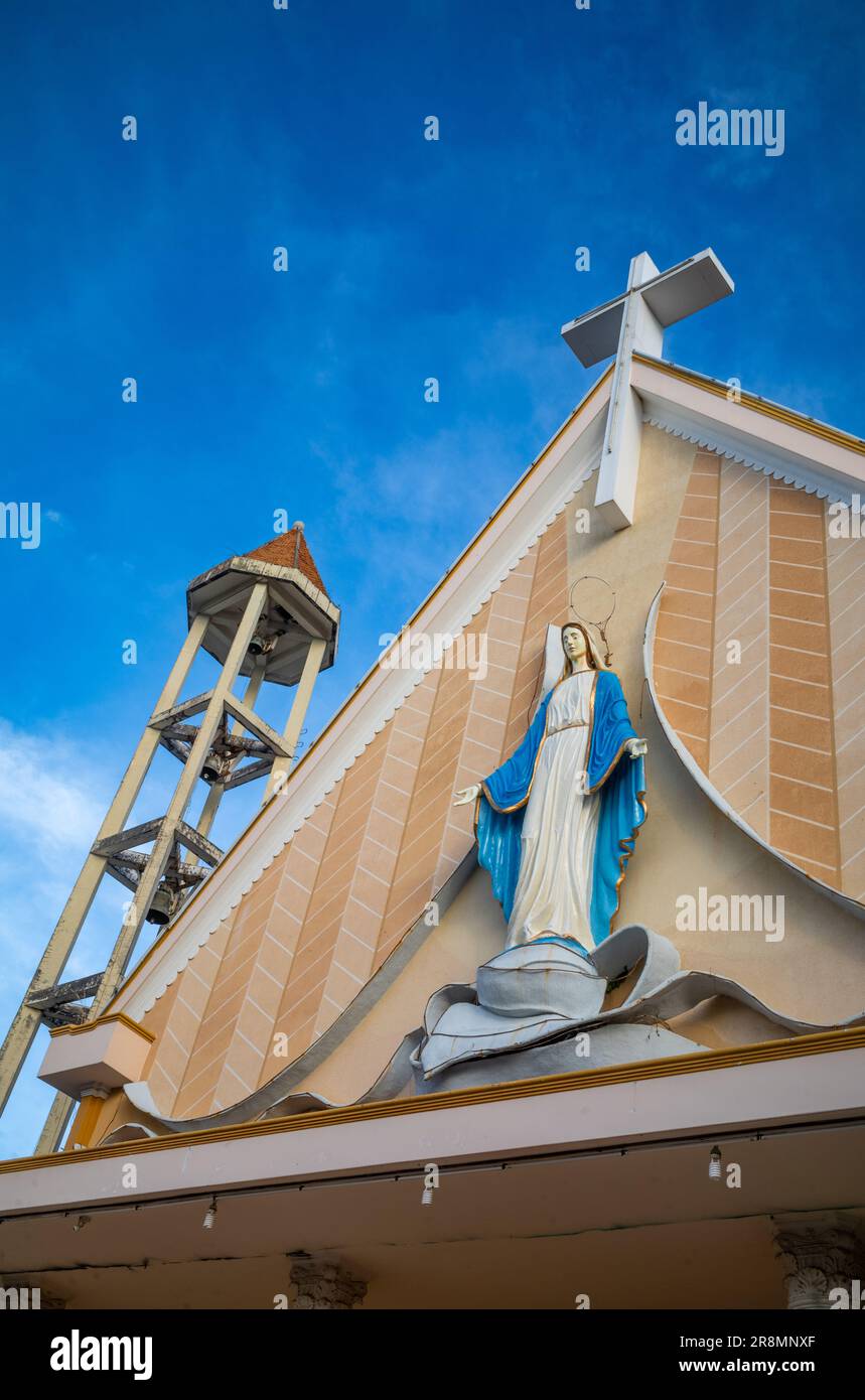 A statue of the Virgin Mary on the front of the Catholic Phuong Nghia