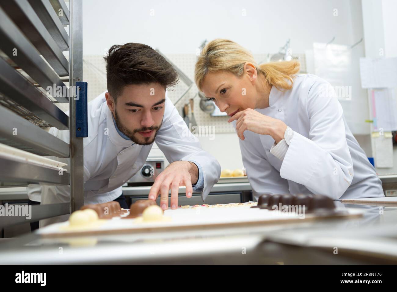 portrait of chocolate factory workers Stock Photo Alamy