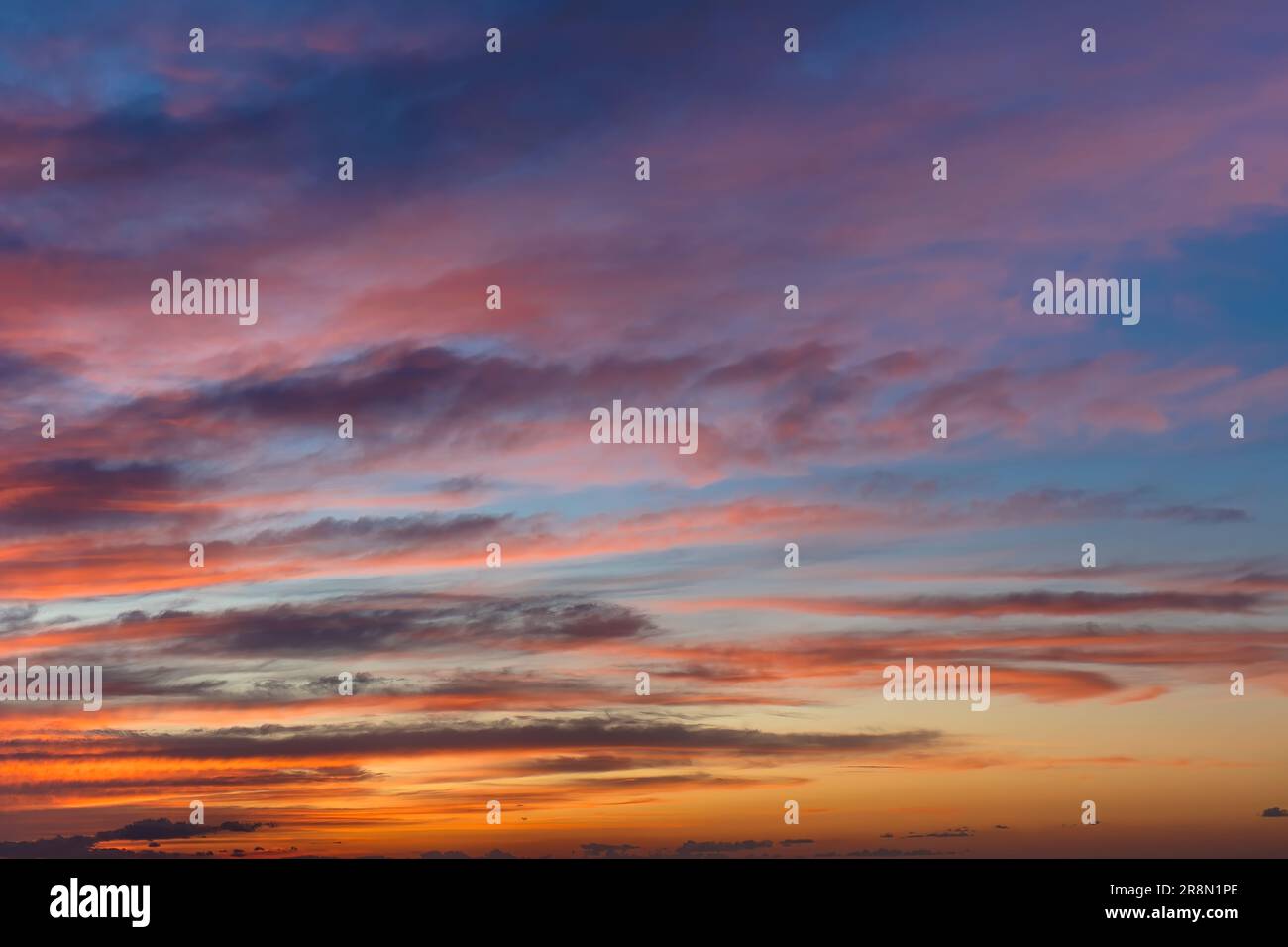 Orange dramatic sunset sky background overlay. Ideal for sky replacement, screen saver or any other application Stock Photo