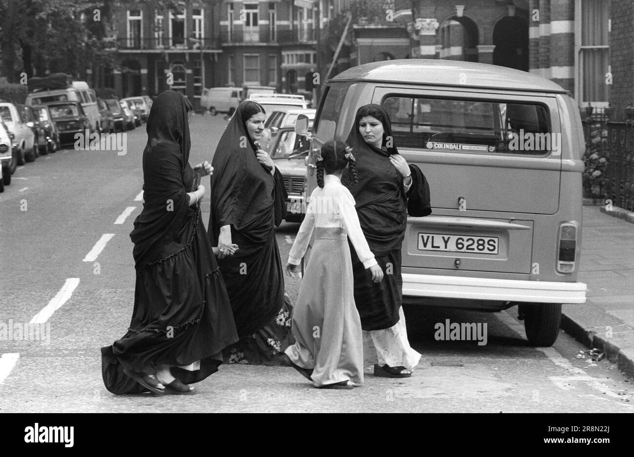 Arab Family in London 1970s. Middle Eastern people came to Britain for subsidised healthcare in Harley Street clinics. They mainly stayed in cheap hotels in Earls Court. Earls Court, London, England circa 1977 1970s UK HOMER SYKES Stock Photo