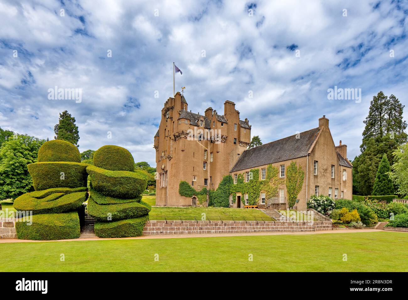 Crathes Castle Banchory Aberdeenshire Scotland a lawn and the topiary yew hedges at Crathes
