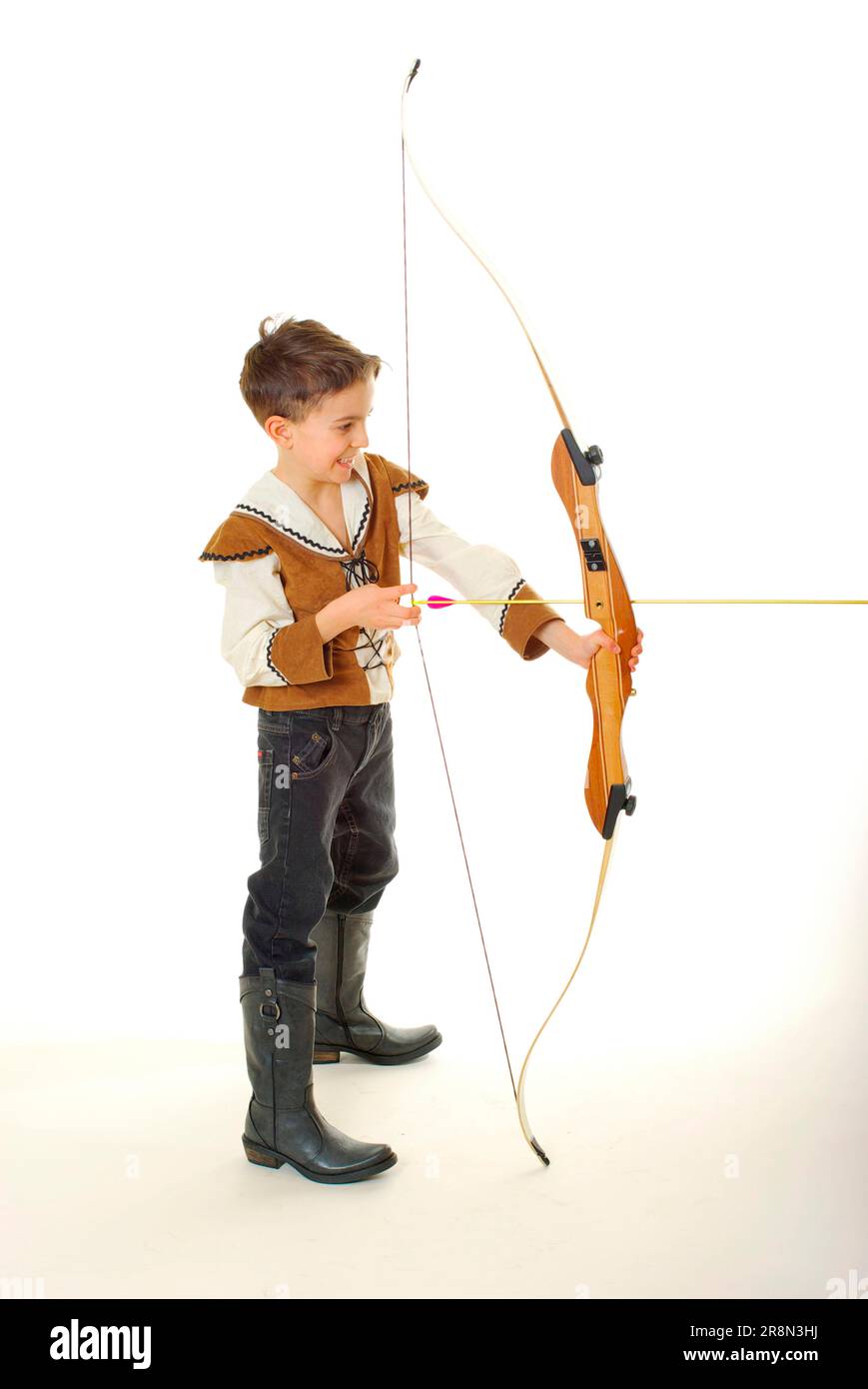 Boy in Robin Hood costume with sports bow, archery, archery shooting, freestyle Stock Photo Alamy