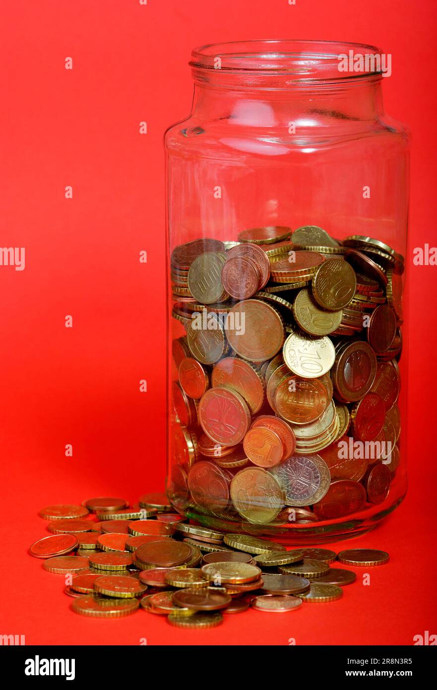 Glass with change, cut-out, object Stock Photo