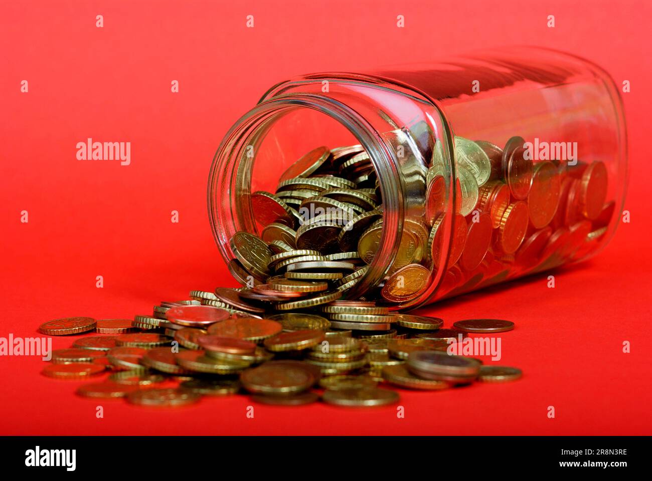 Glass with change, cut-out, object Stock Photo