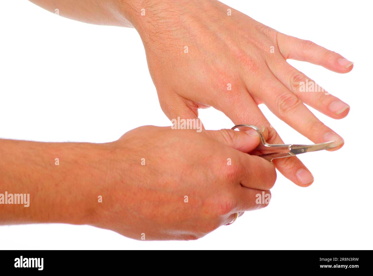 Fingernail cutting, fingernails, nail care, manicure, scissors, nail scissors Stock Photo