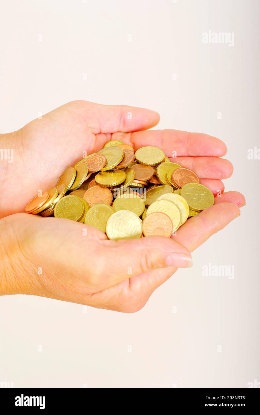 Hands with euro coins, change Stock Photo