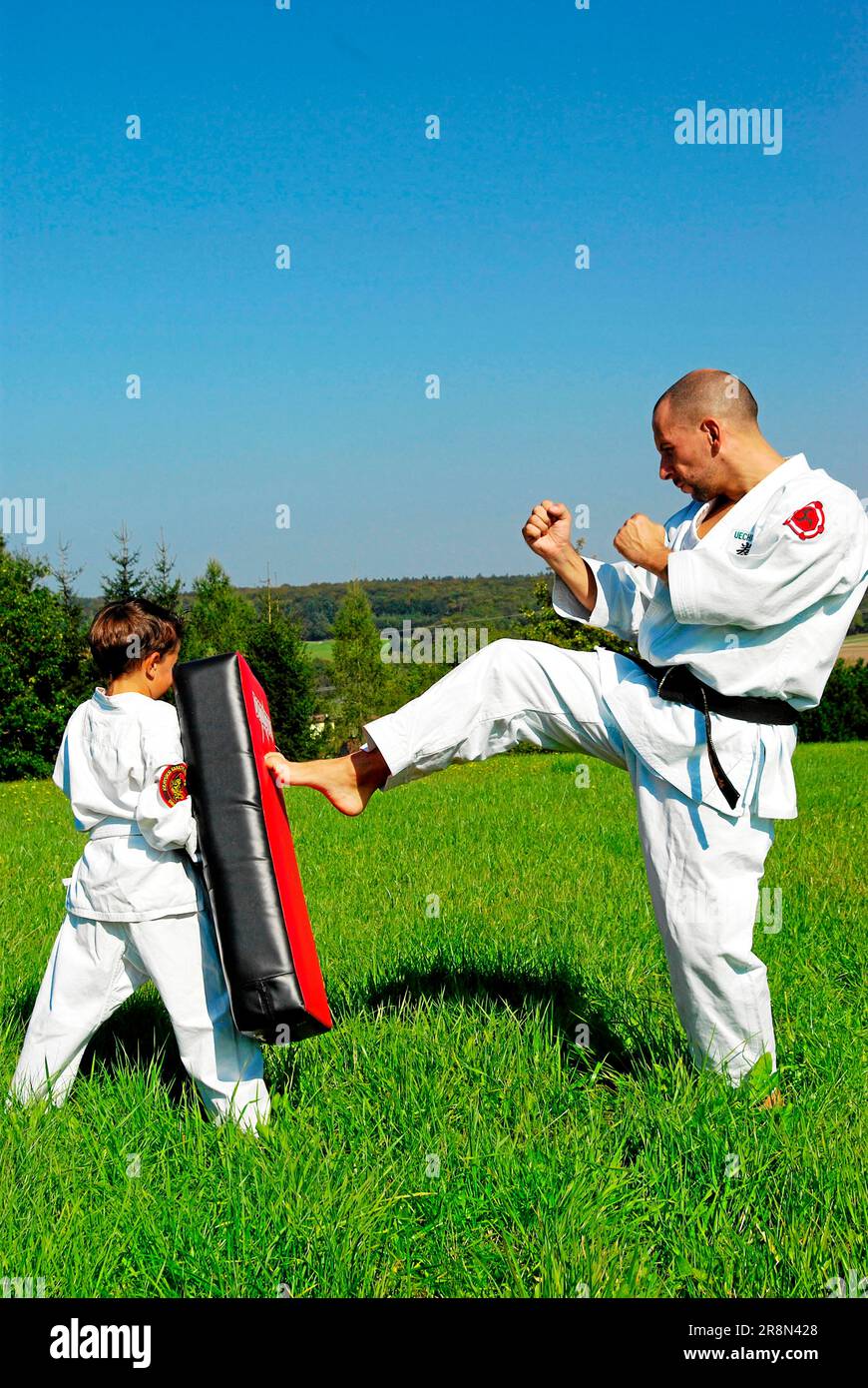 Karate student with karate teacher, karate, student, teacher, martial arts Stock Photo Alamy