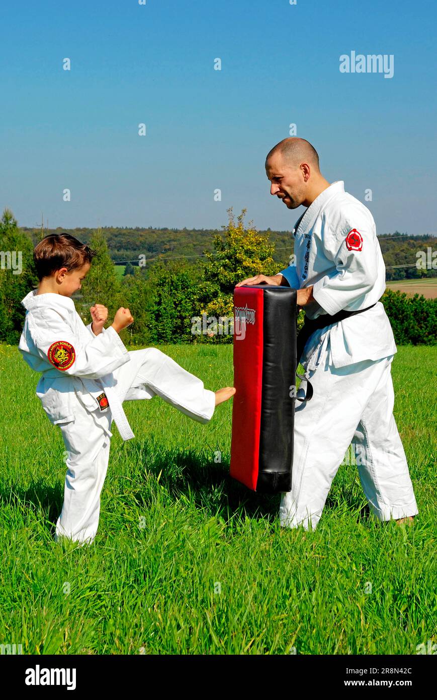 Karate student with karate teacher, karate, student, teacher, martial arts Stock Photo Alamy