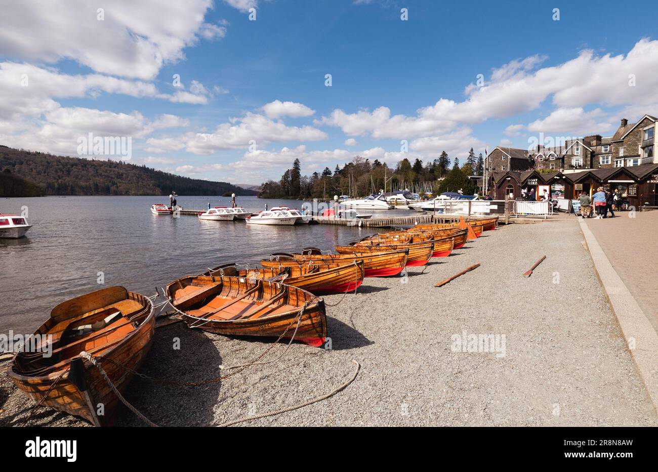 Bowness Bay on Lake Windermere & traditional clinker wooden rowing boats hire Stock Photo Alamy