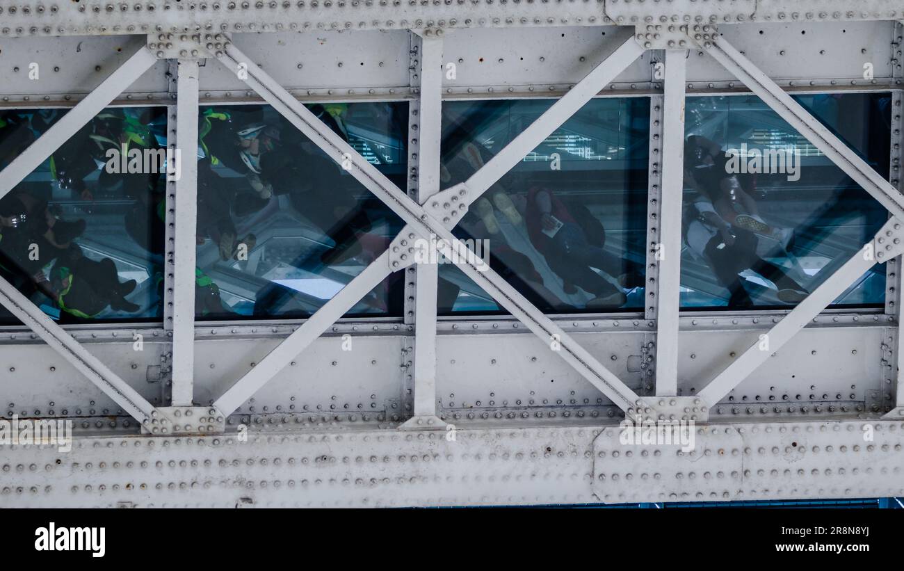 Visitors walk inside London's Tower Bridge Stock Photo - Alamy