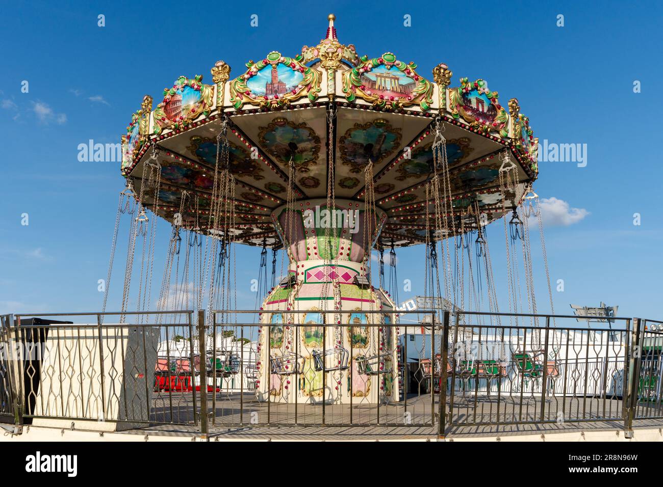 A traditional funfair ride carousel at The Hoppings summer fairground or showground in Newcastle upon Tyne, UK. Stock Photo