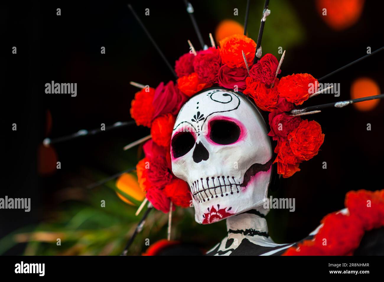A flower-decorated Calaca (skeleton) figure is seen installed on the street during the Day of the Dead festivities in Morelia, Michoacán, Mexico. Stock Photo