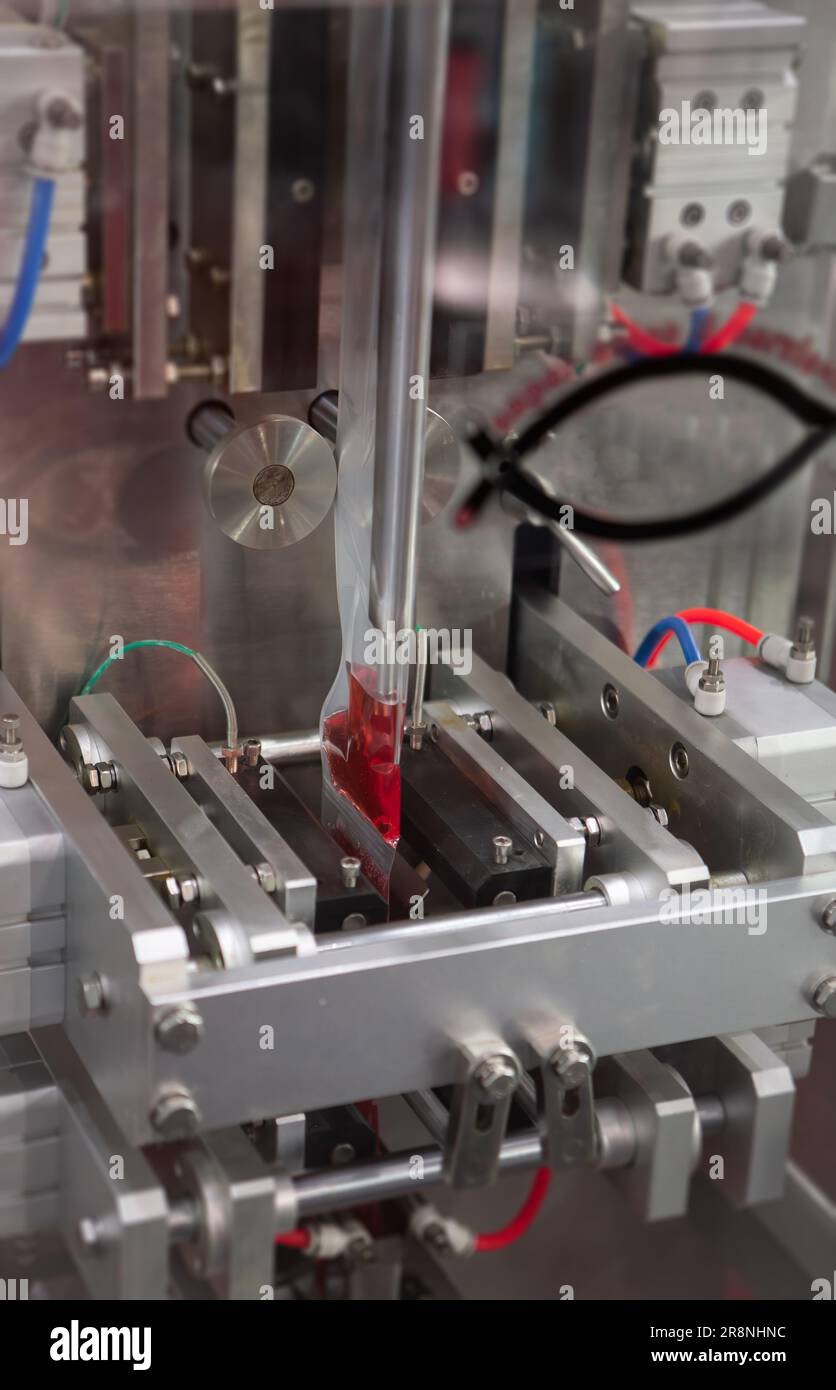 Sauce sachet automatic vertical filling machine Stock Photo Alamy