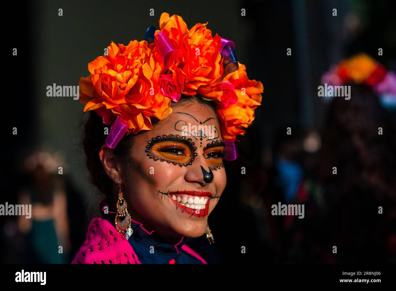 A young Mexican woman, dressed as La Catrina, takes part in the Day of the Dead festivities in Morelia, Mexico. Stock Photo