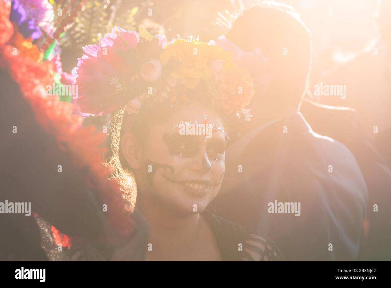 A young Mexican woman, dressed as La Catrina, takes part in the Day of the Dead festivities in Morelia, Mexico. Stock Photo
