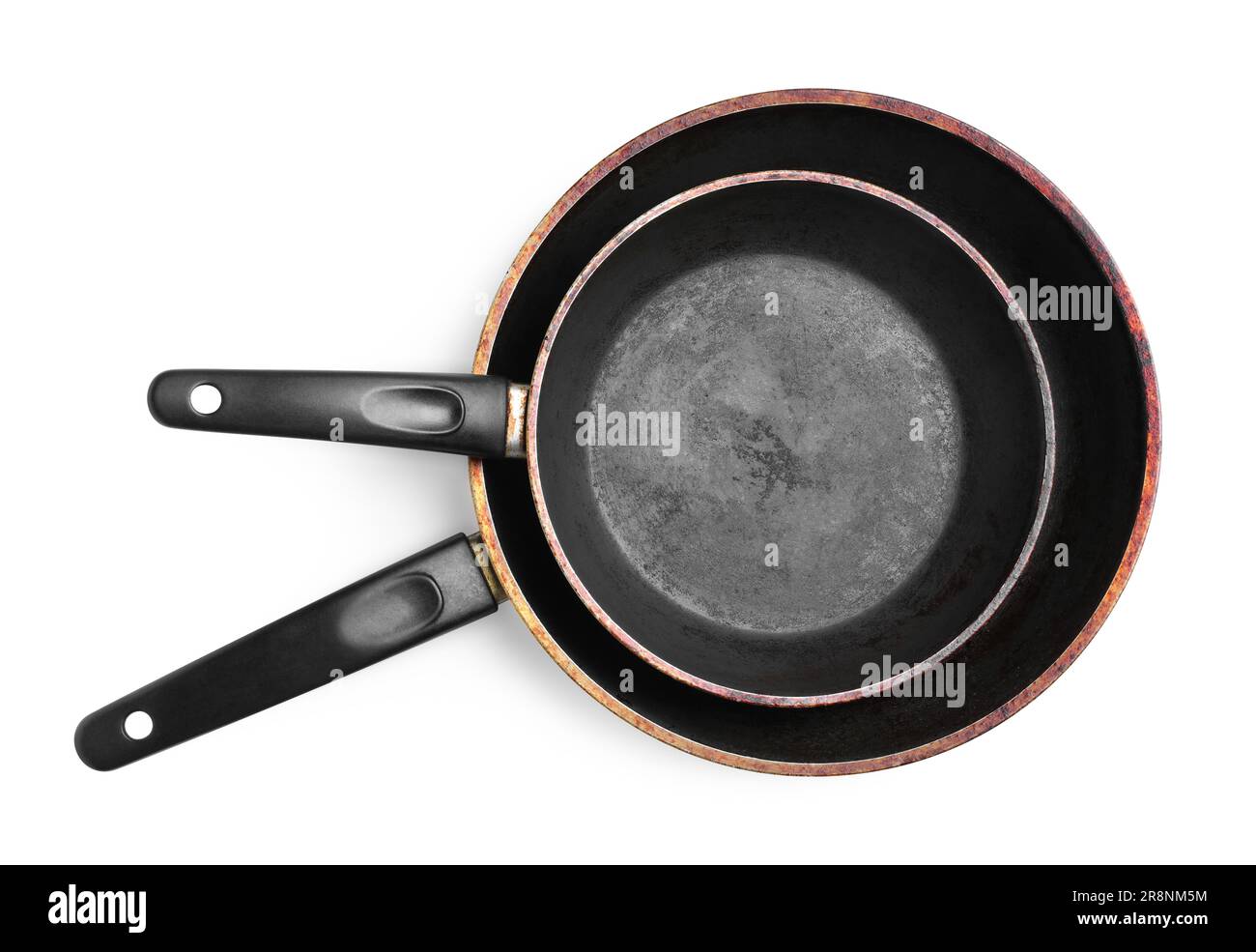 Dirty old frying pans on white background, top view Stock Photo Alamy