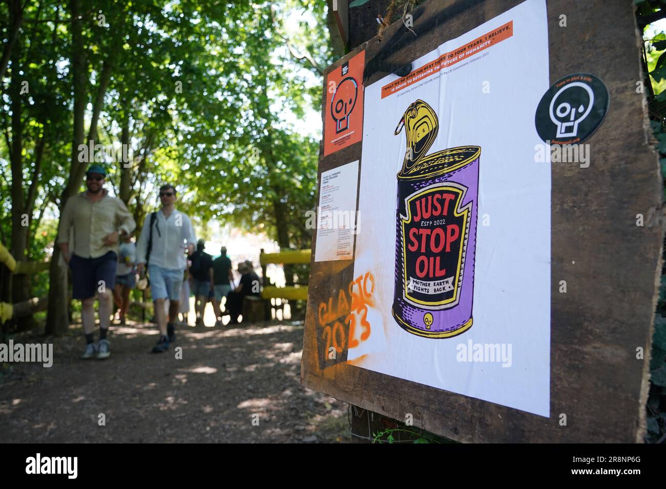 A Just Stop Oil poster at the Glastonbury Festival at Worthy Farm in