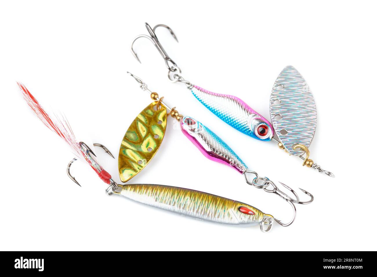 Set of metal lures for fishing shot on white surface Stock Photo - Alamy