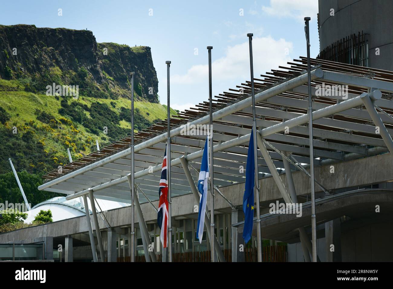 Edinburgh Scotland, UK 22 June 2023. Flags fly at half-mast at the Scottish Parliament following the death of SNP politician Winnie Ewing. credit sst/alamy live news Stock Photo