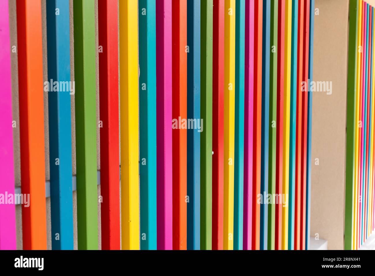colored wall paneling made of wood. Design stripes painted differently