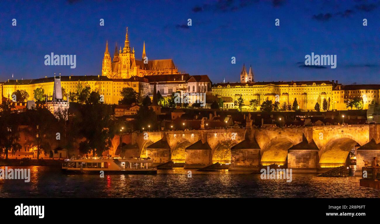 PRAGUE, CZECH REPUBLIC, EUROPE - Prague skyline at night with Charles Bridge, Prague Castle and St. Vitus Cathedral and Castle District, Hradcany, on Stock Photo