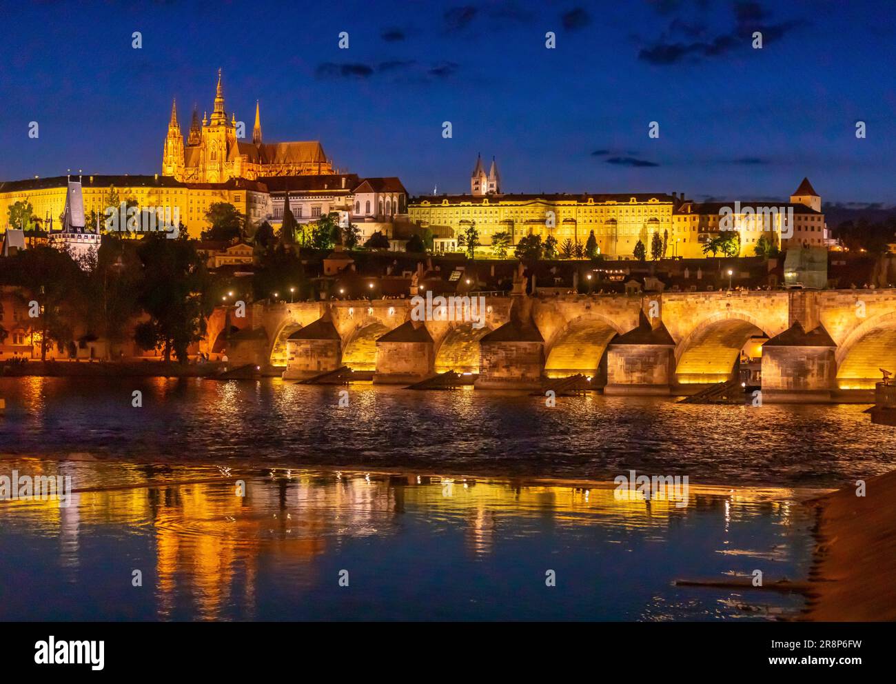 PRAGUE, CZECH REPUBLIC, EUROPE - Prague skyline at night with Charles Bridge, Prague Castle and St. Vitus Cathedral and Castle District, Hradcany, on Stock Photo