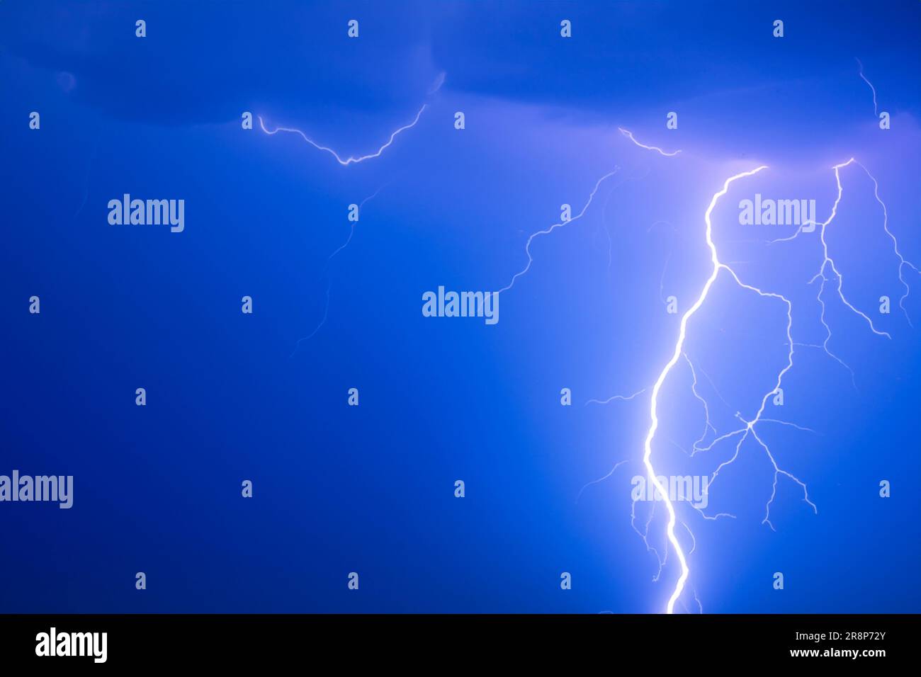 Ray. Lightning storm. Lightning bolt storm. Fork lightning striking. Lightning thunderstorm