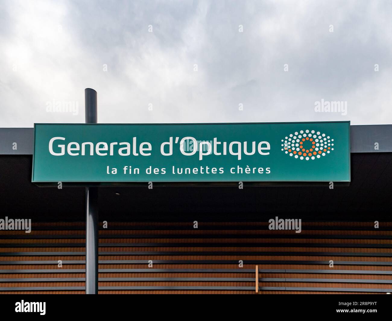 An exterior shot of a retail optometry store with Generale d Optique sign displayed on the storefront Stock Photo