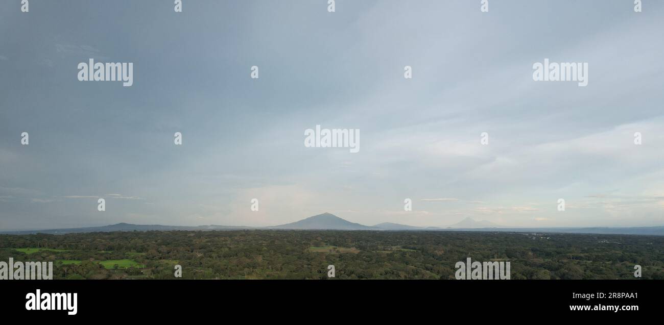 Mombacho volcano on blue sky background aerial drone view Stock Photo