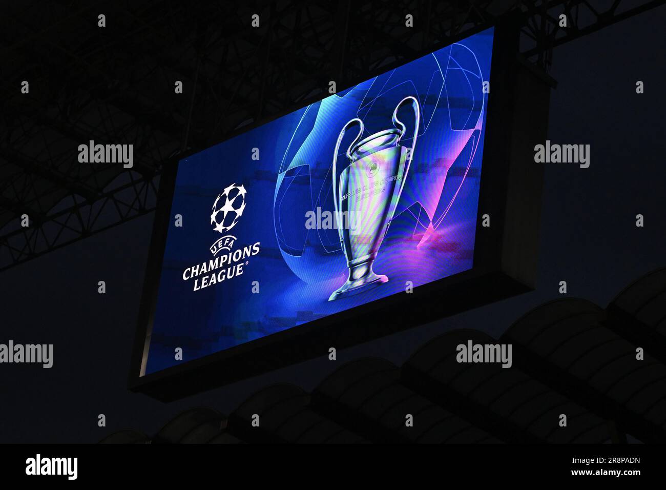The Uefa Champions League trophy is seen on a wide screen at the San Siro stadium in Milan Stock Photo