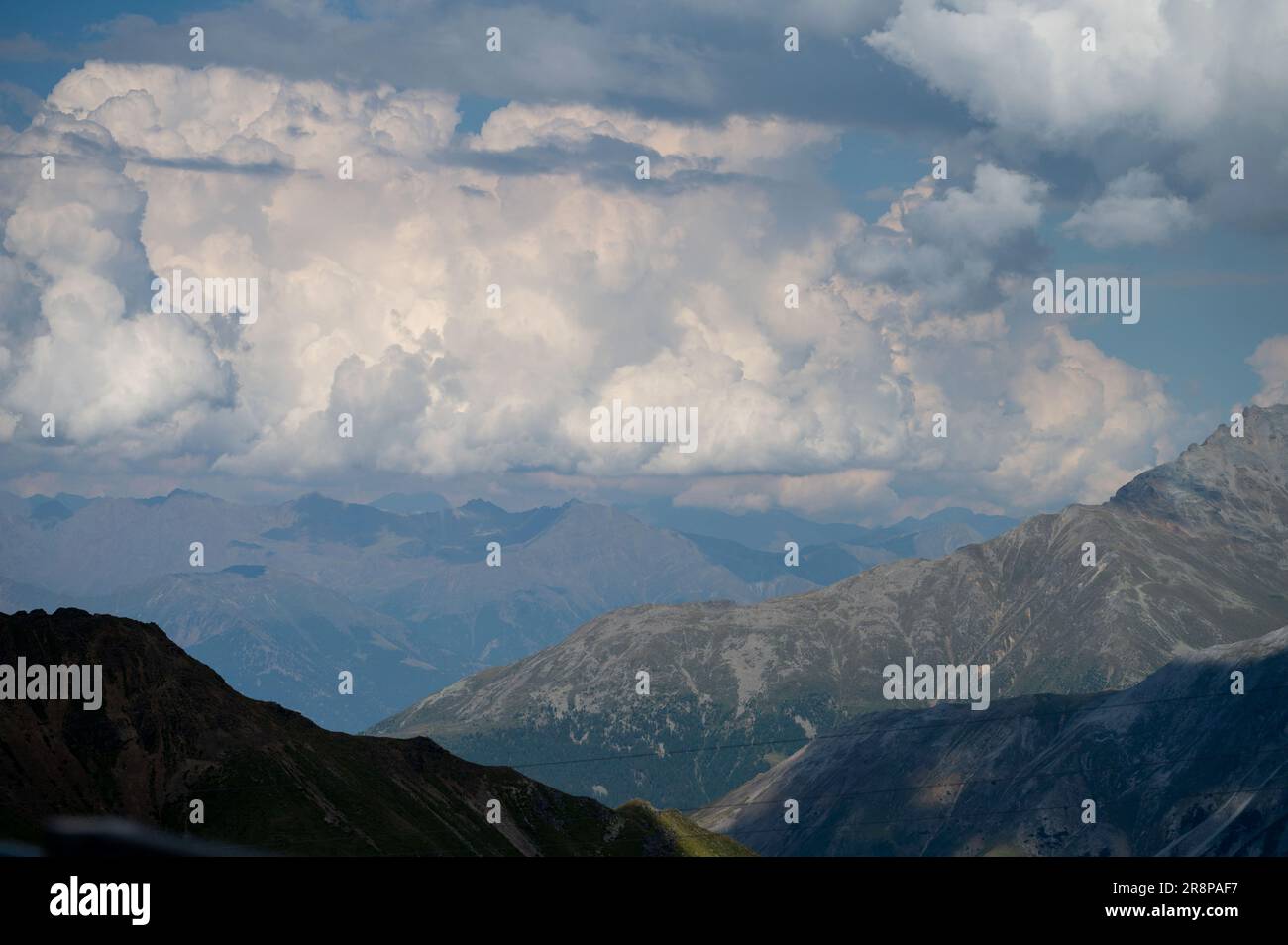 Italian mountains seen from Bormio, the small mountain top town at the top of the Stelvio Pass from Italy into Switzerland Stock Photo