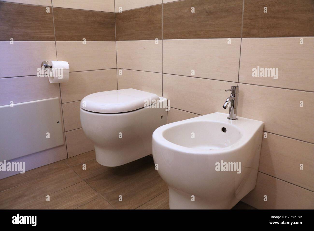 Bidet in a bathroom in Italy. Generic modern Italian bathroom with ceramic bidet washing basin