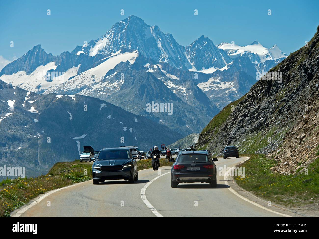Alpine roads in Switzerland, ascent to the Furka Pass, the Finsteraarhorn summit behind, Furka Pass road near Gletsch, Obergoms, Valais, Switzerland Stock Photo