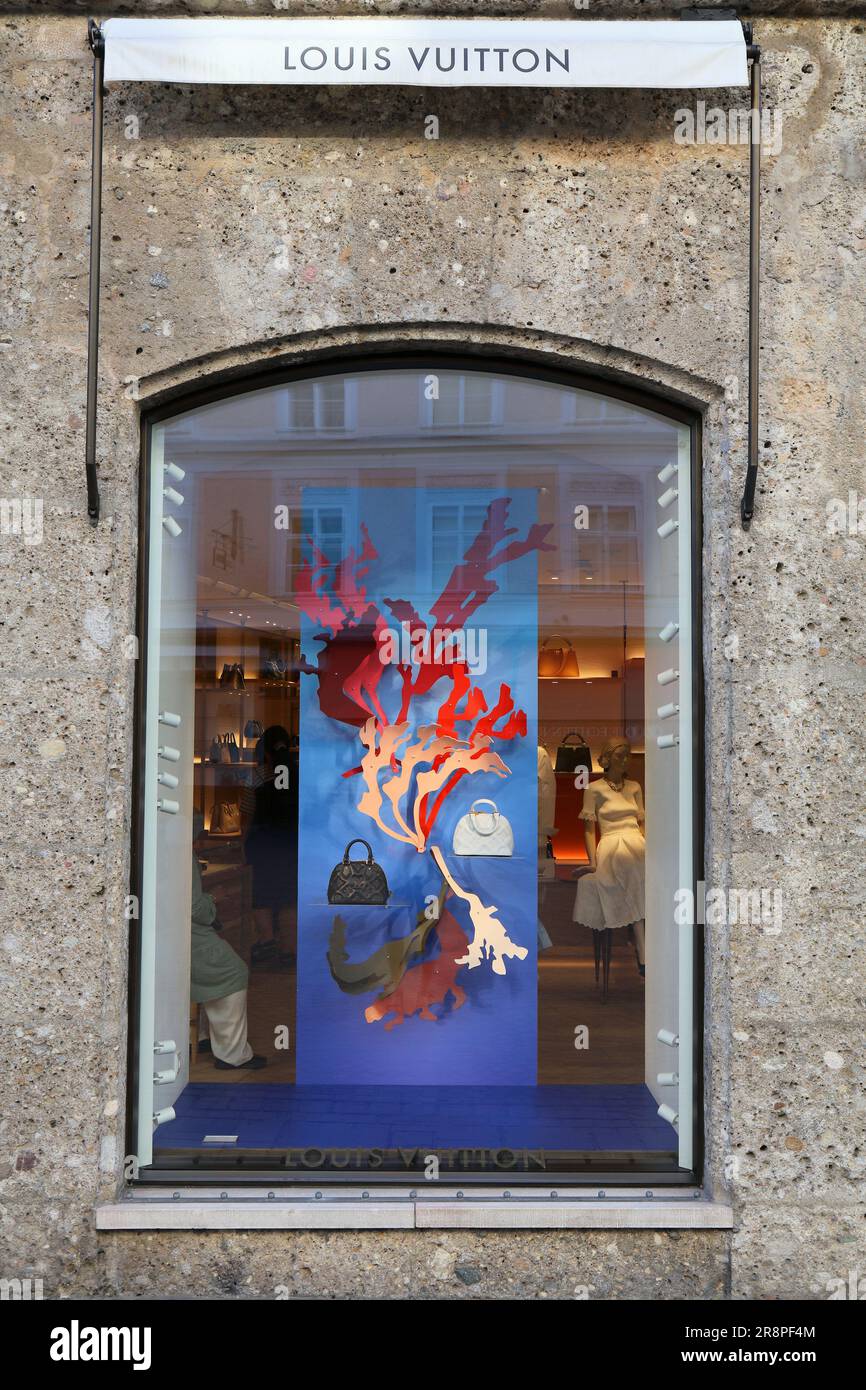 SALZBURG, AUSTRIA - AUGUST 4, 2022: Luxury handbag fashion store Louis Vuitton in Salzburg, Austria. High end French brand Louis Vuitton was founded i Stock Photo